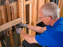 Plumber inspects new construction in Grapevine Texas