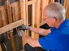Plumber inspects new construction in Grapevine Texas